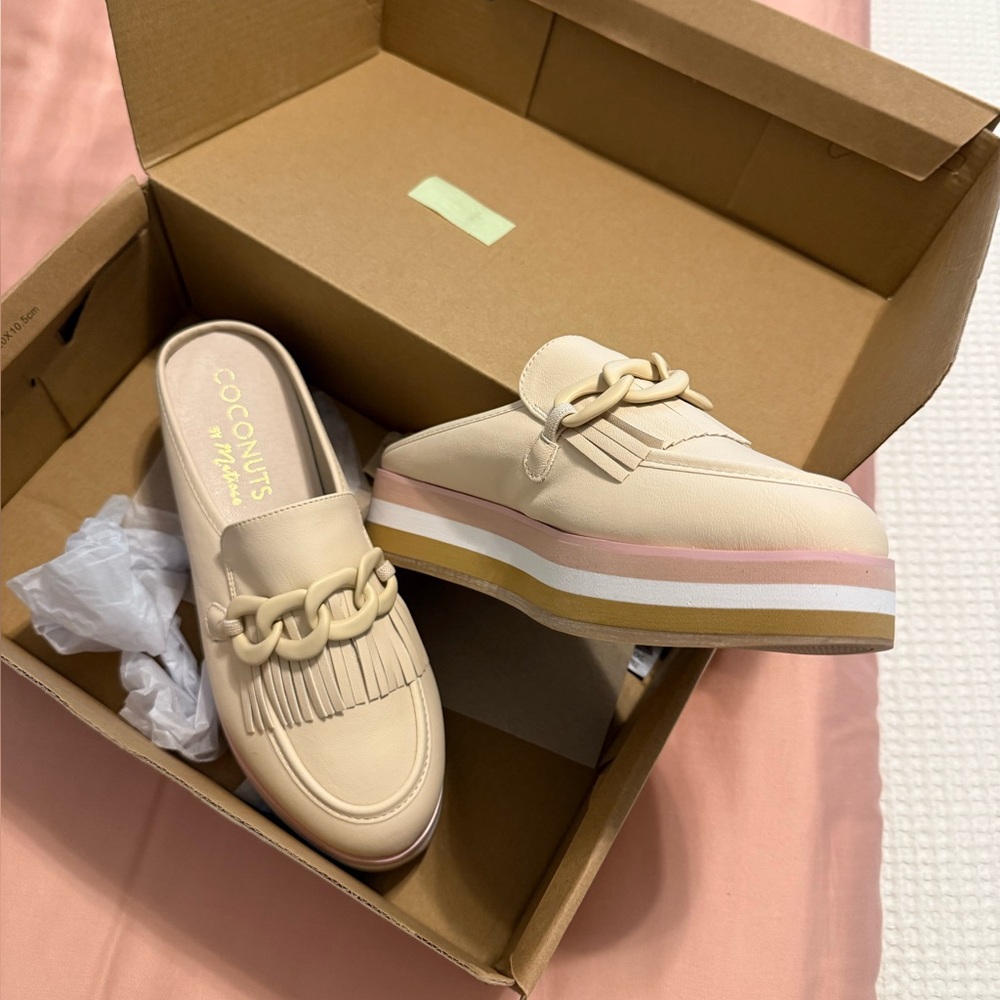 Brand New Coconuts by Matisse slides